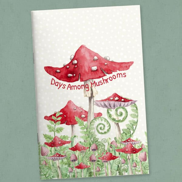 Printable Days Among Mushrooms calendar booklet cover featuring whimsical red mushrooms, ferns, and woodland greenery in a soft watercolor style.