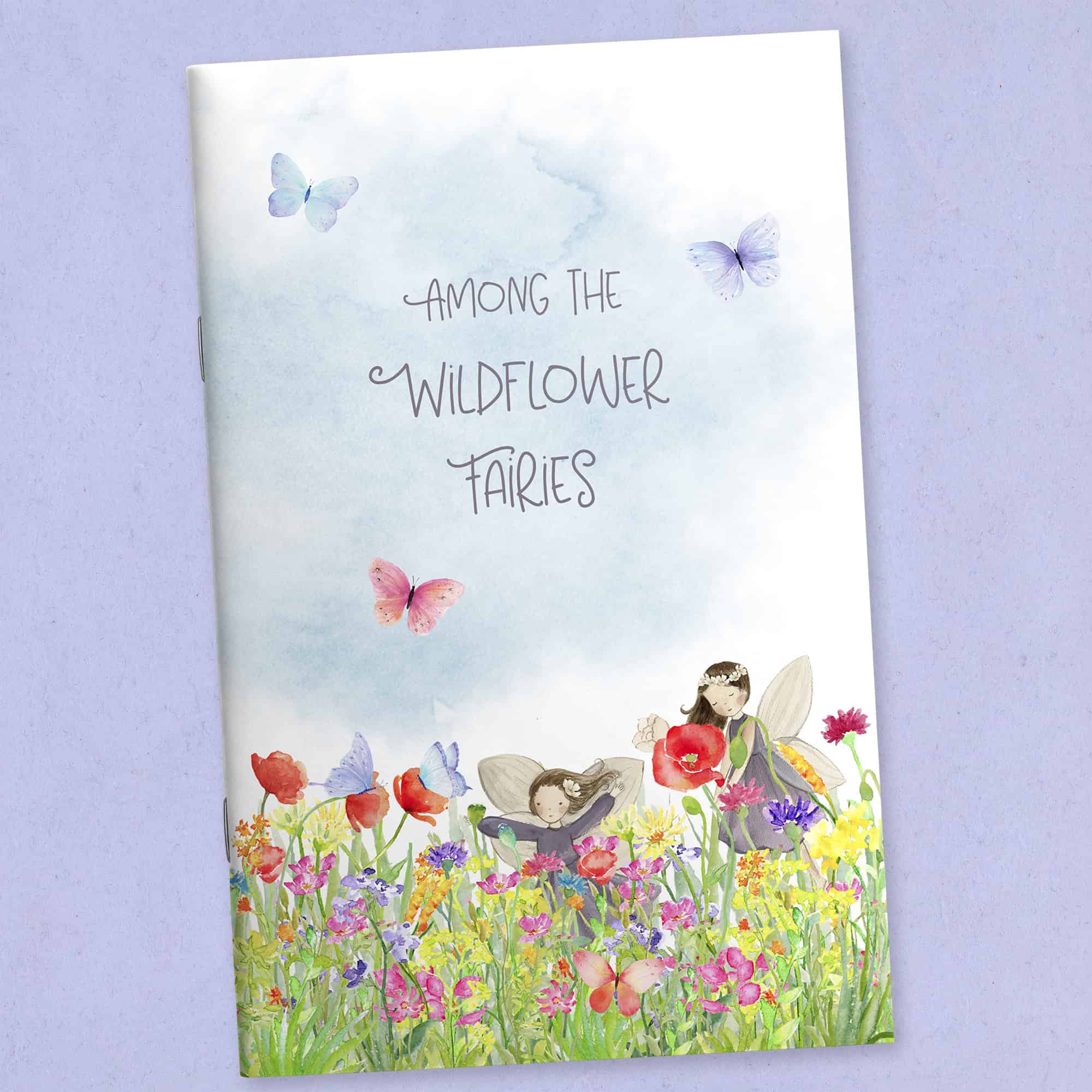 Wildflower-themed printable journal cover with soft floral illustration and whimsical title Among the Wildflower Fairies