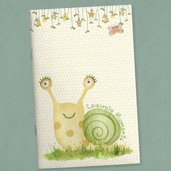 Whimsical snail journal cover titled Leisurely Moments featuring a colorful snail and butterfly illustrations.