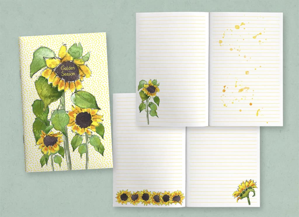 sunflower journal cover shown with two open page spreads decorated with sunflowers